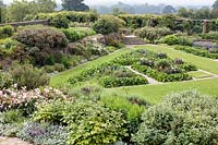 View overlooking a large sunken parterre laid out with geometric borders edged with stone