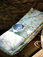 Detail of folded map and compass. 