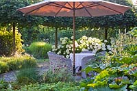 Relaxing seating area with parasol
