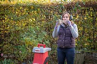 Using a shredder with proper safety kit - goggles, ear defenders and gloves.