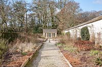 Walled Rose Garden in midwinter, with view to Orangery. 