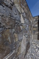 Detail of a drystone wall made of irregularly shaped split olivine basalt