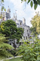 View to the Palace with trees in foreground. Sintra, near Lisbon, Portugal, September. 