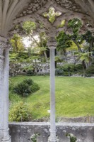 View through the Gazebo on the ornate bridge over the lower gate to the lower lawn.Sintra, near Lisbon, Portugal, September.