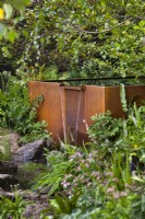 Rusty waterfall feature. The Yeo Valley Organic Garden, RHS Chelsea Flower Show 2021 