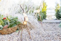 Birch reindeer in a gravel garden