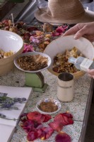 Step by step of making pot pourri, mixing the ingredients, lavender oil