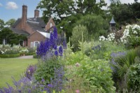 View from the long mixed border towards Goldstone Hall Hotel, Shropshire - June