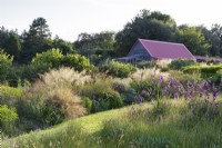 Herbaceous planting, dieramas and grasses; outbuilding