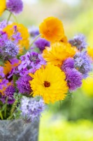 Bouquet containing Calendula 'Art Shades', Phacelia tanacetifolia, Lunaria annua, Chives - Allium schoenoprasum, Eschscholzia aurantiaca