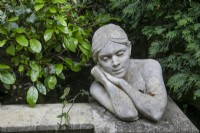 Seja a limestone female bust at Hamilton House garden in May 