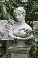 Classical busts at Hamilton House garden in May 