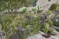 Mixed perennials in the Marshalls Landscaping Garden at BBC Gardeners World Live 2022