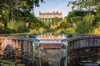 Views of Highgrove House from the Lily Pool Garden, June, 2022.