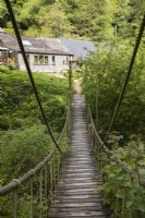 Rope bridge with view to the outbuildings. May
