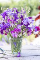 Bouquet of flowers containing Lathyrus 'Midnight Blues', Gypsophila elegans 'Covent Garden', Agrostemma githago - Corn cockle, Salvia viridis 'Blue Monday' and Briza maxima