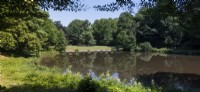 Essen North Rhine-Westphalia - Nordrhein-Westfalen Germany
General view over the park on a summers day with blue skies. View over the Margarethensee Lake. Stitched panorama