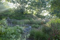 View of the circular pond in the Dragon Garden