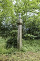 Urn on tall wooden column in the Lime Avenue. August.