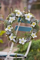 Wreath  with mistletoe, Christmas rose, lichens and pine twigs.