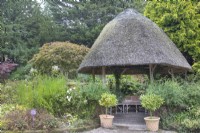 Thatched seating area in Ness Botanic Garden, Liverpool, September