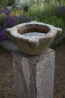  Antique Marble Mortar bowls set on oak post re-purposed as  bird baths.

