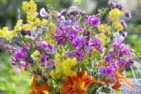 Summer bouquet containing Monarda, Sweet pea, Hemerocallis, Verbena bonariensis, Fennel and Galium verum.