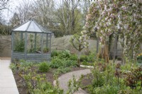 Malus 'Sun Rival' in the Ornamental Kitchen Garden at Barnsdale Gardens, April
