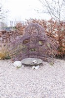 Bird bath with woven birch protective fence