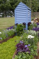 Blue beehive in the 'Bee Inspired' - Beautiful Borders at BBC Gardener's World Live 2018, June
