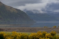 A view of placid water on Lochcarron and the surrounding hills from Attadale Gardens.