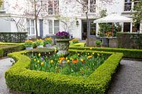 Formal garden with seating area 