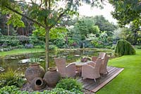 Seating under silk tree, Albizia julibrissin 