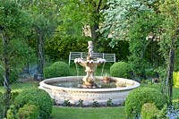 Formal garden with fountain, Sorbus aria, Tilia cordata 