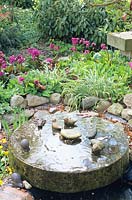 Millstone as a water feature 