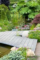 Pond with wooden deck 