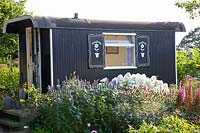 Old trailer as a garden house 