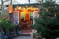 Christmas decorated garden house 