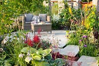 Seating terrace, Astilbe, Hosta, Primula vialii, Ligularia 