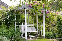 Pavilion with bench, Rosa Rose Marie Viaud 