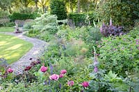 Bed with herbs and perennials 