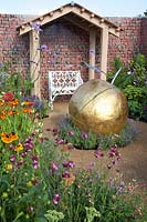 Garden with golden apple as an art object 