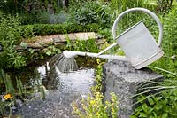 Watering can as a water feature 