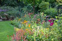 Bed with annual summer flowers and perennials 