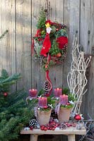 Door wreath and Advent wreath with four clay pots 