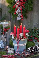 Advent arrangement in a zinc bucket 