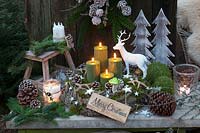 Advent wreath made of tree bark and moss 