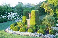 Garden with Thuja hedges, Stachys byzantina, Taxus, Thuja occidentalis Brabant, Thuja occidentalis Smaragd 