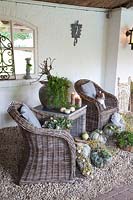 Autumnally decorated seating area 