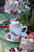 Bird food in a cup with robin motif 